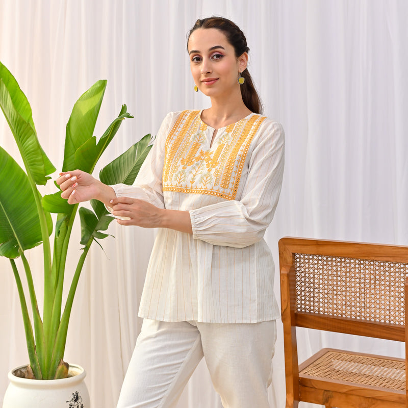 Off White Peplum Top with Yellow Embroidery Detail