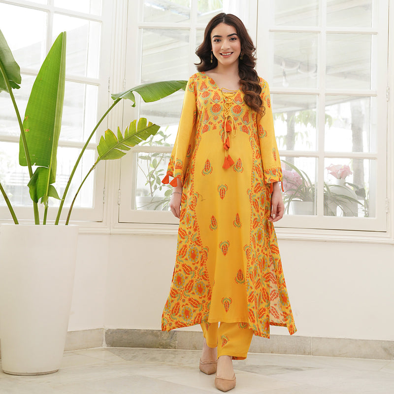 Mustard Paneled Kurta Pant Set with Tie Up Neck Details & Flared Sleeves