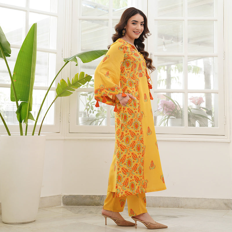 Mustard Paneled Kurta Pant Set with Tie Up Neck Details & Flared Sleeves