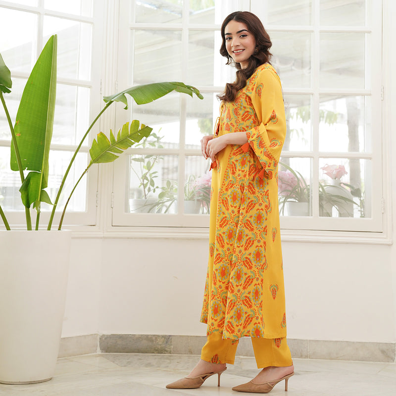 Mustard Paneled Kurta Pant Set with Tie Up Neck Details & Flared Sleeves