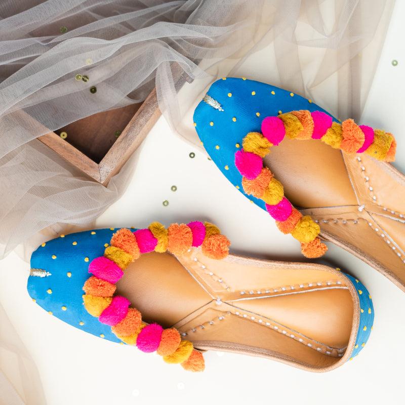Blue Pompom Jutti with Knot Detailing